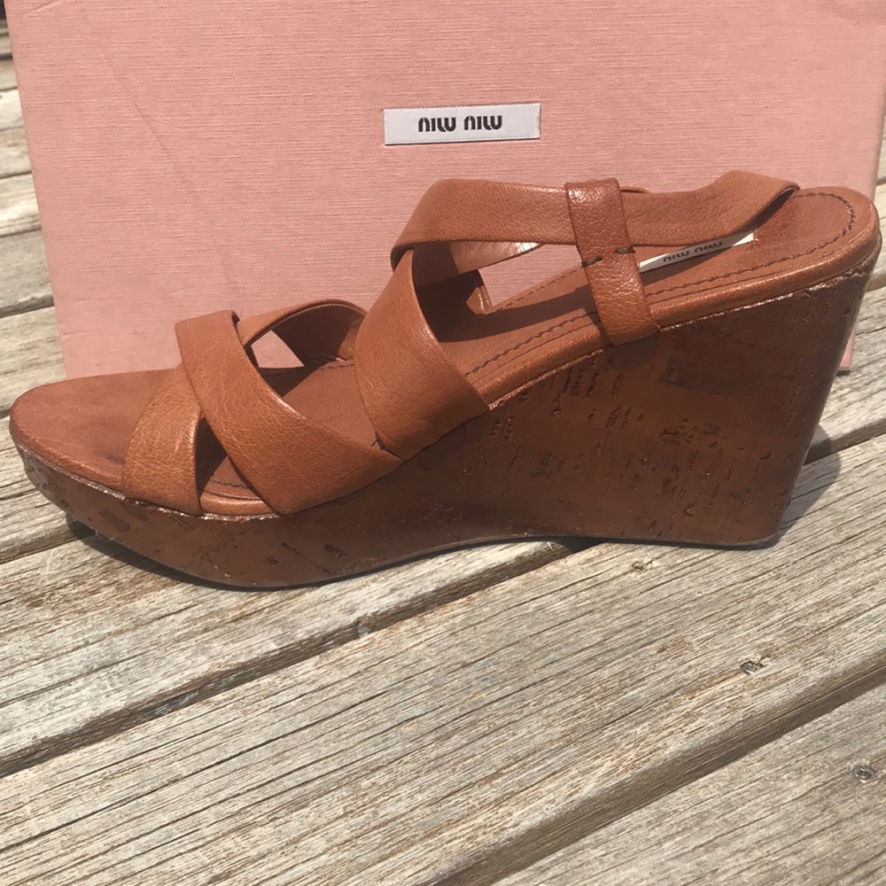 Great pair of miu miu sandals.